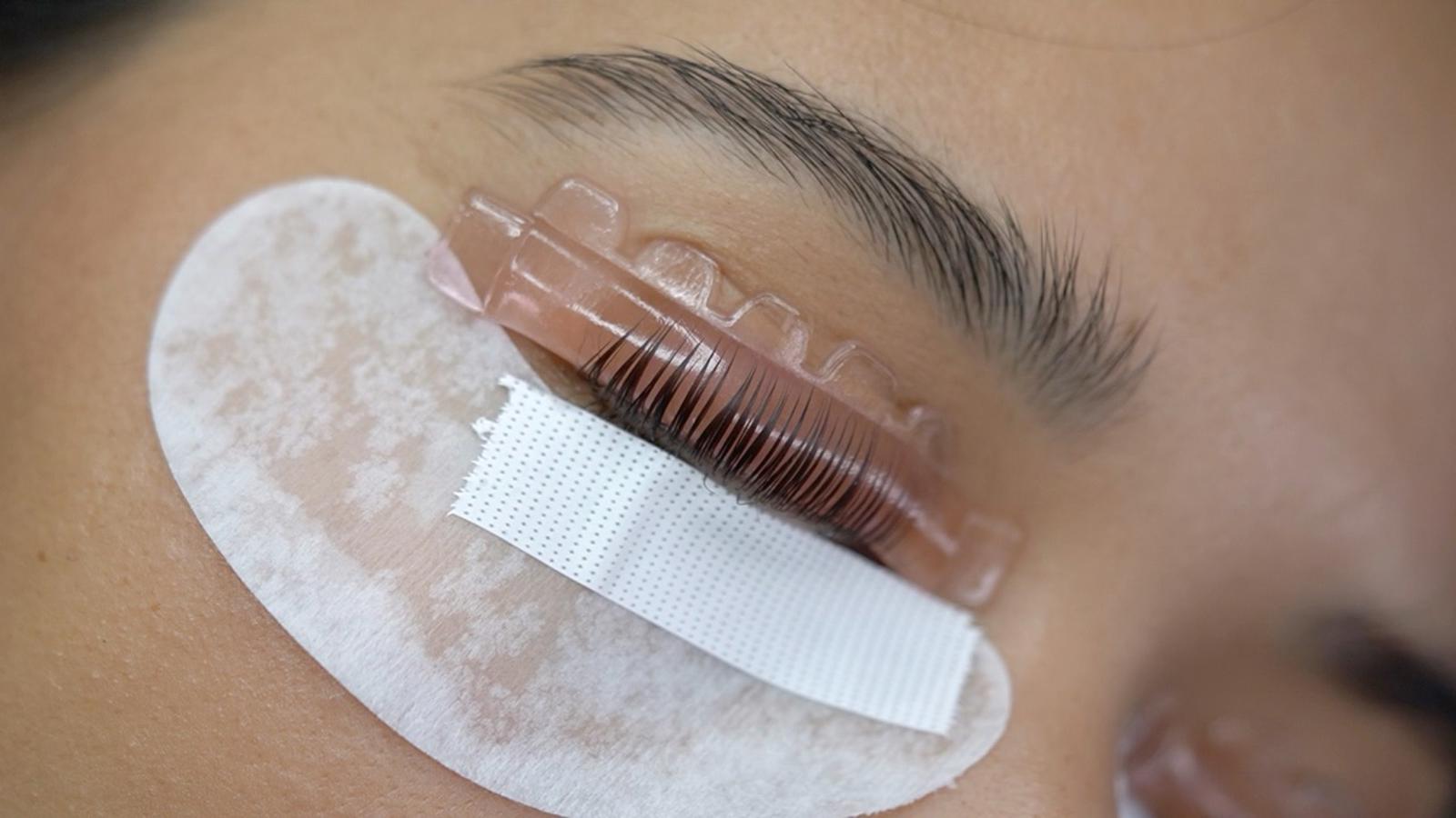 Before and after Korean lash lift showing lifted natural lashes